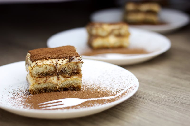 Creamy tiramisu dessert dusted with cocoa
